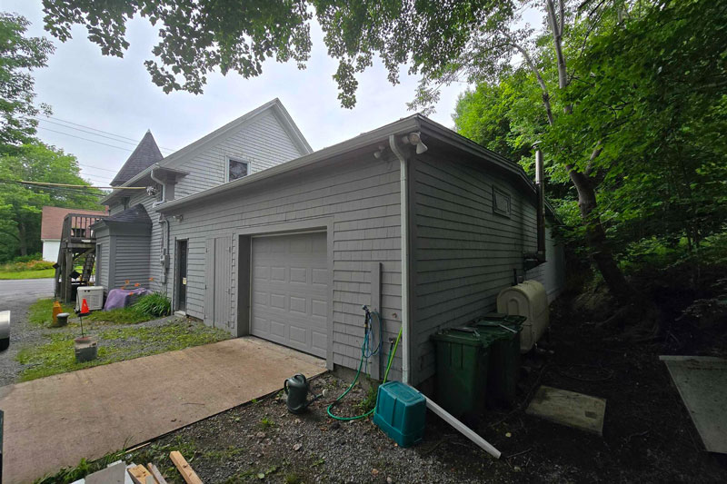 Exterior view of overhead door and driveway