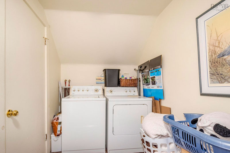 Laundry area next to bathroom
